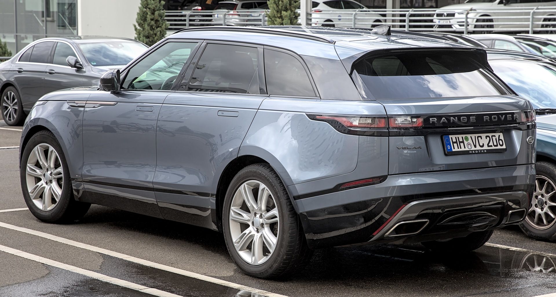 Range Rover Velar in grey, rear three-quarter view