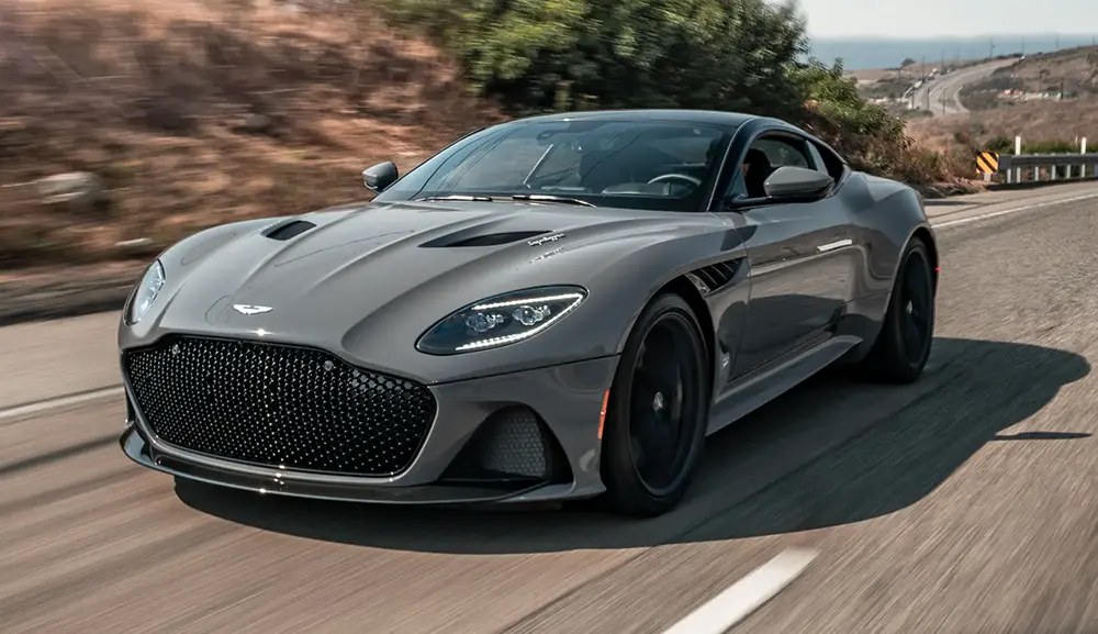 Aston Martin DBS in China Grey driving a coastal Malibu road